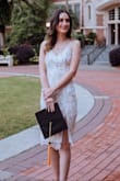 I was looking for something for graduation day/pictures that was classy but also more unique than just a plain dress, this dress fits like a glove and is sooooooo flattering, I love how it cut in the front and the floral embellishments added such a nice touch, LOVED! - Jordan W.