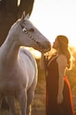 Honestly fell in love with this dress but I was between sizes so I was a little nervous about ordering a small. This dress fits 100% true to size! I dont have the biggest bust so the adjustable straps were a live saver! I bought it for a fun photoshoot with my horse and oh my goodness it was magical. It is long, but it worked for what we were doing. (: Will definitely be searching out occasions to be able to wear this dress again. I'd recommend getting it hemmed professionally as tulle can be tedious. As a whole, it felt very high quality, was breathable, non-constricting, comfy, beautiful, lightweight...the list goes on!! Love love love. - Victoria B.