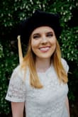 I bought this dress for my MSW graduation pictures and it both fit and photographed well! - Helmi H.