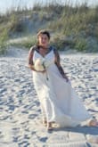 My 20 year vow renewal on the beach in this dress was a dream come true. I ordered an XL but had to size up for my bra band area. I usually wear a size 12 jeans, 38DD and a L shirt. This dress was flowing in the wind, it was magical in pictures. Buy it! The Ivory was beautiful. - Natalie B.