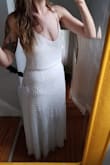 This dress is completely dreamy. It'll be my rehearsal dinner dress (although would also be a perfect wedding dress). Just a tad see-through but easy fix with the right undergarments, but the fit is a dream. The straps are easy to adjust so it can reveal as much or as little cleavage as you like. I cannot wait to wear this super comfy ethereal dress. - Allison G.