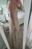 Originally ordered a small and couldn't even do the zipper up, so definitely order up a size. Very lightweight, ideal for a hot climate. Comfortable and well made. Very happy with the dress. - Zoe C.