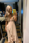 Wore this as a wedding guest and got so many compliments, the dress is comfortable and flattering in every way, and would be, I feel like for anyone's body shape. It's a little zip up in the back with a tie waist band, everything is adjustable which I love and I DIDN'T need a bra hahaha that's a nice plus. Highly recommended this, the small fit perfectly on me! I'm 5'6, cup size is 34C, I weigh 138-140 lbs and usually fit into S/M's - Ashlee S.