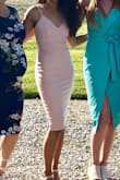 I was on the fence about ordering this dress, then once it arrived and I tried it on I still wasn't sold about how the color looked on my skin. Blush was the only light color available when I ordered. Being small breasted I also worried I wouldn't be able to fill the dress when going braless. In the end I couldn't find anything I liked more, so I wore this one and was happy with it. I got lots of compliments on the dress, and I didn't feel color or lack of cleavage was a problem. It does ride up a bit, but that wasn't a big deal at all. - Seneca K.