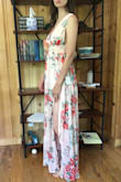 I am about 3 months pregnant and was very nervous about all the reviews saying the waistband was far too tight, so I ordered this in a medium and my usual small and hoped at least one of them would fit. Turns out I had nothing to worry about, the small fit with plenty of room to spare for breathing and slouching and eating. The neckline feels pretty secure, but I'll probably use some fashion tape so I can feel more comfortable bending over. The length is perfect for me in flats but would be slightly too short in heels, but I imagine this wouldn't be a problem for anyone shorter.
FYI, laying flat the medium waistband measures 14.5" across (so should fit up to a 29" waist) and the small measures 13.5" across (so should fit up to a 27" waist). It hits at my underbust which is 26" relaxed or 24.5" pulled tight. - Amy S.