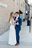 I bought this for our civil ceremony, and it was perfect! I had it altered to fit, as the top was a little large for me (small chest). I got the length hemmed to be a little shorter in the front, and to touch the floor in heels. - Kayla G.