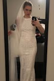 This dress is absolutely stunning, and looks 10x more expensive than it is. It fits perfectly, even with my small chest, so it's a great style for girls with a similar build.  I'll be wearing 2 inch heels with it, which will make it the perfect length, but you'll probably have to get it altered if you're shorter than my height of 5'9!  Hopefully they keep this one in stock for a while, it's the perfect wedding dress!

(It doesn't have any stretch tho, so if you're worried about sizing, you'll need to take that into account.) - Anna S.