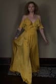 I looked like the sun at a wonderful summer Boston wedding. I received all of the compliments. Only small problem is the button clasp in the chest area kept coming undone. Thank goodness the bathroom at the venue had a safety pin. Otherwise my smallish chest would have popped out. - Lauren C.