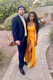 I wore this dress to my best friends outdoor wedding in Arizona so it was about 104 degrees at the time of the ceremony! This dress is made with such great quality! The fabric is thick but it's still light and airy! I did not sweat in this dress at all! The slit is so high and sexy, the dress just flows and the back is sexy as well! It's the perfect mustard yellow! I got so many compliments on the dress! If you have a an event to attend and you want to wear a long sexy eye catching dress! Get this!! You won't be disappointed my boyfriend said I looked so beautiful in the dress! - Kajavia R.