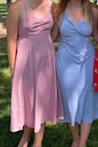 Wore this dress for my graduation. The length is perfect and I especially love the open back! It was a bit loose on my chest, but I have a very small bust so I wasn't surprised. Wish I had ironed it, but that's on me. Would recommend! - Lily M.