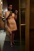 Is such a fun and flirty dress !!! I weigh 140 and the medium was a lil tight, but it worked perfectly, I wouldn't get a bigger one. The orange is so beautiful !!! - Nora A.