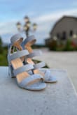 I bought these heels to pair with a dress & necklace I aso got from Lulus to wear to a wedding. These shoes are SO cute! I received a lot of compliments in them. I'm normally a shoe size 7.5 in anything I have to wear socks with, so I risked it & ordered a standard 7 in these heels, and they fit perfectly. I did have to use some blister protector pads on my big toe & pinky toes because the front strap rubbed pretty consistently on my feet (enough to leave blisters), and the front half of my foot ached quite a bit by the end of the day. Admittedly the event was the first opportunity I had to wear them, and I had them on for about 7 hours straight. I definitely plan to wear them again, I'll just be more prepared to make adjustments to hopefully get them a bit more comfy next time. But SUPER CUTE! - Rachel S.