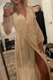 Love this dress! Adjustable waist line depending on tightness of ribbon. Not see through. Good material. - Emily H.