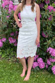 Ordered this dress for my Bridal Shower and it was perfect. The skirt for perfectly out of the bag (I'm a size 3 in Hollister jeans), but the top was a little loose. I had it taken in (very affordable) and that solved the problem & for around $100 total I don't think you can beat it! The fabric is of great quality too. (Mirror photo before alterations) - Julia B.