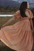 I love the color, the material and the style of this dress. It's different and cute and definitely "me". I chose to wear this dress for some of our engagement photos! They turned out so beautifully. - Yuki D.