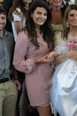 I got this dress for my niece's baptism and it's a beautiful soft pink and flatters in all the right places. Slightly snug in the rib cage area but I have pretty broad shoulders which could be why. The tie-around waist also helps hide any waist insecurities you may have like I do - Jessica F.