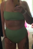 Super flattering, comfortable and exactly what I was looking for in a bathing suit, and feel comfortable and confident in it. Fits perfect for my usual sizes large bottom medium top and the fabric and color are great! - Samantha S.