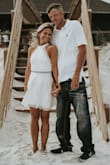 I purchased this dress specifically for my wedding photos in Destin, Florida. Everything pertaining to this dress is absolutely perfect! I'm not sure how else to describe it other than what it is/was. I knew that it was going to be sandy on the beach so I was looking for a shorter dress to accommodate with that. I HIGHLY RECOMMEND this dress to everyone looking for a cute dress! This was my first time shopping at Lulus, but it will definitely not be my last. I am an avid online shopper to the point of it possibly being an issue lol, but you can never have enough clothes! - Tajah P.