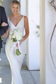 I always wanted an elegant wedding dress that fit beautifully, was classy and not overpowering.  I was so surprised to find my dress at Lulus.  This dress fit "off the rack" without alterations!  I received so many compliments - who would have known it was priced at less than $100!

Finding undergarments for this dress can be a challenge.  Regardless of your size, EVERY line will show through this dress.  I was able to go without a bra, although I would recommend a silicone skin bra (Can be found at Target).  Most importantly, after trying numerous undergarments, save yourself time and money and go with the Spanx High Power Capri Shaper.  These are footless and virtually seamless while smoothing everything.  (Purchased from Nordstrom which seems to carry a good amount in stock) - Jillian M.