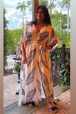 Light and flowy without loosing "glamour" (lol). I order this dress for my birthday dinner at 7:30pm. You can wear it during the day or at night with flats or high heels (have a foot injury and had to choose flats - Connie B.