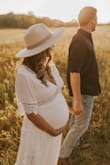 Obsessed with this dress, it was absolutely everything I wanted for our maternity shoot! I'm 130, size small pre pregnancy. At 37 weeks pregnant I'm 160 and the medium fit perfectly! Perfect amount of room for the belly while still fitting nicely everywhere else. All the dreamy boho vibes! - Kait D.