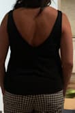 This is really comfortable. I said it runs large because I usually wear a Medium/8. This fits fine but it is on the short side. Super soft and comfortable. - Christina C.