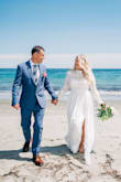I felt beautiful in my dress. It was just what I imagined and fit perfectly for a beach setting. The style was chic, comfortable, light weight and flowy. - Donna G.