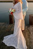 My fiancé and I decided to get married on the beach.. I was lucky enough to find this dress and have it delivered within a few days (I only had 8 days to prepare). The dress has a little give to it, so it fit nicely in all the right places. It was cut low (which was OK with me) and the length is long, but again, I loved the way it flowed behind me (I didn't wear heels). I received a ton of compliments on this dress. THANK YOU Lulus for a beautiful dress, efficient delivery, and a nice dress bag too! - Michele C.