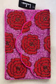 I ordered this because I liked the contrast of what I thought was light pink and red-orange; the specific color combination I was looking for. When I received the item, it was fuchsia and bright red. The clutch itself is well made, although the beading is only on the front. Overall, I was dissatisfied with how drastically different the colors were from the photo. - Olivia B.