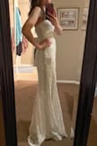 In love with this dress! Bought this for a simple wedding next month and couldn't be happier with the fit, fabric, color, and just the dress in general. I didn't want to spend more than $100 on a dress, but still wanted to look bridal. This dress is perfect! Slightly tight on me, but actually like that fact because I feel more secure in the tighter fit with it being strapless. Also long for me but should work fine with some tall heels. - Alyssa P.