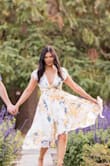 I used this dress for my engagement photos and it was stunning. The high to low was perfect for the windy photos . I got so many compliments. One thing that I would say is the front is kind of loose. You have to wear bra cups in order for not to see your bra. I put tape to hold the dress in place, but overall this dress is beautiful. - Lisa M.