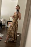 I bought this for an outdoor casual wedding. I'll either need to tape my bust or get the V stitched slightly because the little snap button pops open when I move my upper body. But I'm keeping it! - Kristin M.