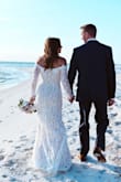 This dress was everything I wanted for our beach elopement! The material was great and stood up to walking in the water and sand. I got so many compliments on how this was the most beautiful dress people had ever seen! It was stunning in our photos. - Sarah H.