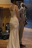 I used this as my reception dress at my wedding and it was wonderful. Nice, thick material. It was a little long on me but I didn't bother getting it hemmed so that's on me. It's extremely comfortable and flexible. I could've done cartwheels in it with no issue. The best thing was I didn't have to worry about it getting dirty or have wine spilt on it. I've added a nice unflattering picture so you can see what it does with panty lines but whatever. It was super comfy. - Melissa S.