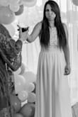 I absolutely loved this dress, I wore it to my bridal shower and it was perfect. I needed to order a medium because it was a little tight in the chest area and I'm usually a small. - Amanda R.