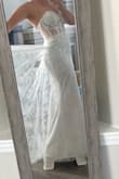 I absolutely love this dress! I'm wearing it for my wedding! It fits true to size! I am only going to tailor it to take a few inches off the bottom. I have to tailor most dresses anyway for my height.
This dress really feels and looks designer. Amazing for the price! So excited to have some beautiful wedding pictures in this! - Jennifer Z.