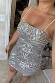 This dress is so pretty and perfect for bday celebration. I got in two sizes because I wasn't sure about the stretch on hips/thighs but the medium fit perfect! So happy with my purchase! - Bessy B.