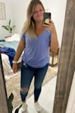 Okay I have this in mauve, white, purple, and camo and I am obsessed. The shirt is long (and I am tall!) so I usually tie it to the side. It makes the ladies look great and the colors are so nice. I will say after a few washes and drying, the underarms are pilling a little but doesn't take away from the 5 stars for me because I have worn each of these at least a million times!! - Tiffany M.