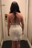 I ordered this dress in a M and L for my bachelorette, just in case. The medium was PERFECT- it stretched just enough, was comfortable, and photographed perfectly. A steal at this price. - Jessica H.