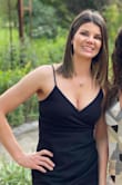 This dress fit like a glove. It can be worn with a strapless bra or not. The material is good quality and a medium weight. I wore this to an indoor/outdoor wedding in Texas and it was perfect. Slimming, little black dress you can wear for many occasions. - Aimee J.