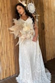 Bought this dress for a pre-wedding shoot. Absolutely blown away by the material, quality and fit. The pictures came out beautiful and the price was a bargain. Wish this came in another color for my maid of honor! - Mayra V.