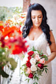 Absolutely stunning. Using this as my wedding dress but I need a size smaller. It's made very nicely and it's exactly what I wanted. Simple and elegant and very comfortable to wear. - Tara L.