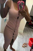 The color is just as pictured but this dress is super ill fitting. The stretch allows for the dress to open where the buttons are creating a much sexier look than I bargained for. Not the best investment of your money. - Lisa F.