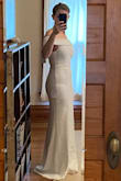I exchanged the XS, which fit better in the bodice, for the S which is pictured in my photos and works better for me in the hips. Of the two dresses I'm wavering between, this is my friends' favorite because it's unusual and classy. The fabric is stretchy, smooth, and comfortable, and it feels like the top will stay put. I considered hemming it to just-below-knee length, because it is also beautiful that way. With a few inches off the hem (Photos show me in 3" heels), this may be the dress I end up with! - Gennevieve W.