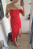 This is exactly what I wanted this dress to be. Gonna wear for my bachelorette party and I can't wait. The ruching in the front is so flattering so I can feel confident that I'll still look good even after a bunch of beers and a late night pizza. Fits as described, just gonna need to get it pressed so the bottom evens out a bit. This is such a "wow, look at me" dress! - Erin B.
