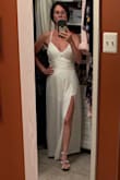 Bought this to celebrate our 25th anniversary. The bust was perfect with a strapless bra but I decided to take it in slightly and add cups to wear it without a bra. I also hemmed the length about 3.5 inches because I'm only 5 feet tall. Absolutely love it! It flows when you walk showing off your legs and shoes! - Robin B.