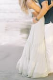 Got this dress for engagement photos on the beach. The open back is my favorite part but it's also a great material, a soft sage color and oh so comfy. It's not too heavy of a dress either! **it looks white in pics bc of the edit, but it's a soft sage green** - Sabrina T.