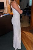 This dress is gorgeous and the fabric is good quality but it wouldn't hug my body as much as I hoped and the back, especially in the zipper area fit a bit weird with the zipper kinda pupping out. - Tarlan C.
