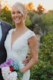 I love this dress!!!! The material on this dress is not too thick or too thin.-perfect for my small outdoor wedding. I am considered a mature bride-I wanted something classy and fitting but not too tight and this was the perfect dress. I first ordered the small, which I usually wear, but it was too big on top. I will be returning that one. I did a rush order for an extra small and received it in two days. Great job, Lulus! The extra small was perfect. I would recommend ordering a size smaller than you usually wear. - Karen P.