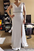 This dress was my top pic. Overall the design was stylish and the cutting made me look slimmer. I especially loved the shoulder part as it adds some blings into the dress. However, the dress was way too long for me. I believe they did it on purpose and expects you to go get it tailored. My tailor was more expensive than my dress because it has 3 layers. Overall loved it - Denise K.